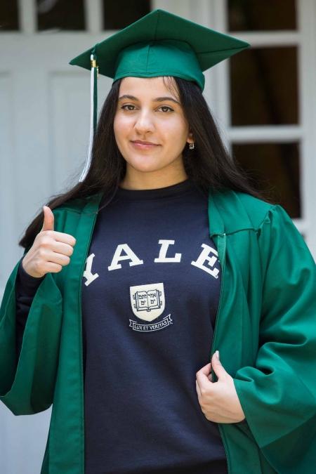 Gabriella Fernando wears the colors of her high school alma mater, the HS for Environmental Studies in Manhattan, and Yale University.