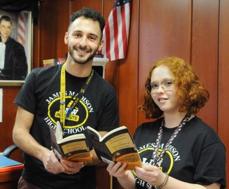 teacher and student hold copies of the Declaration of Independence