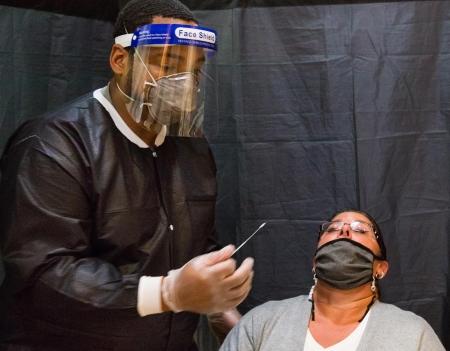 A teacher gets tested for covid