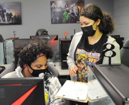 Two students discuss strategy