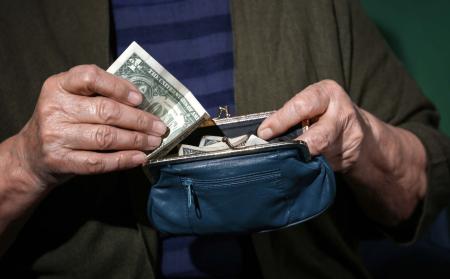Hands handling money