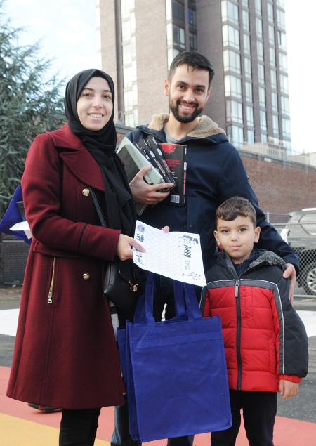 A family in attendance at a Brooklyn family UFT event. 