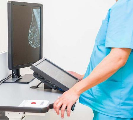 Doctor looking at mammogram