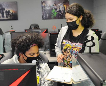 Two students discuss strategy