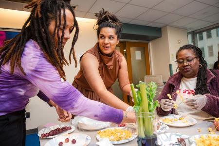 Collaborating at the “Science You Can Eat” workshop are (from left) paraprofessional Heather Parker-Davis of Brooklyn’s PS 315, paraprofessional Jasminie Jones of District 75’s P4 in Queens, and teacher Tiny Delaney of Richmond Pre-K Centers on Staten Island.