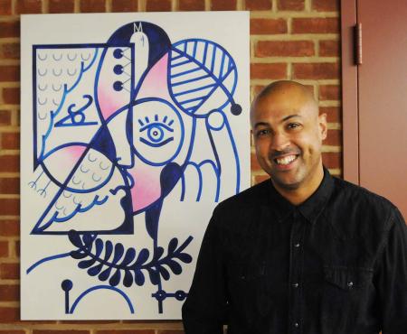 Artist with painting
