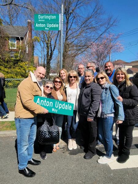Family and friends of IS 34 teacher Anton Updale at the renaming of the street where he grew up.