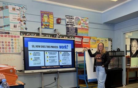 Image showing a UFT chapter leader holding a "teach-in"