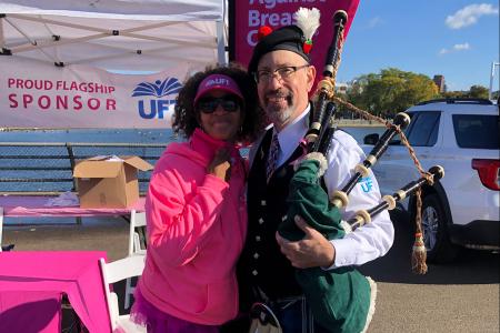 Queens Strides Coordinator Greer Hansen-Velazquez (left), with bagpiper Richie Niccolich, a teacher at PS 174 in Queens.
