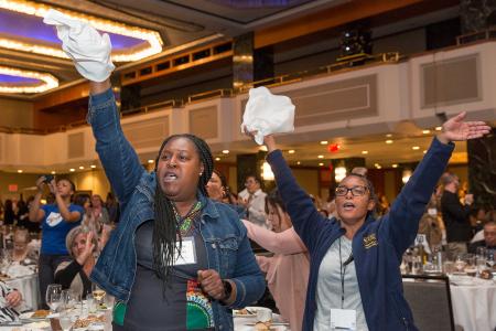Pre-K teacher Shakesha Simmons (left) and paraprofessional Betty Checo, both from Teachers College Community School in Harlem, show their enthusiasm.