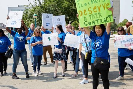Members protesting for the right to annual retention bonuses in 2023.