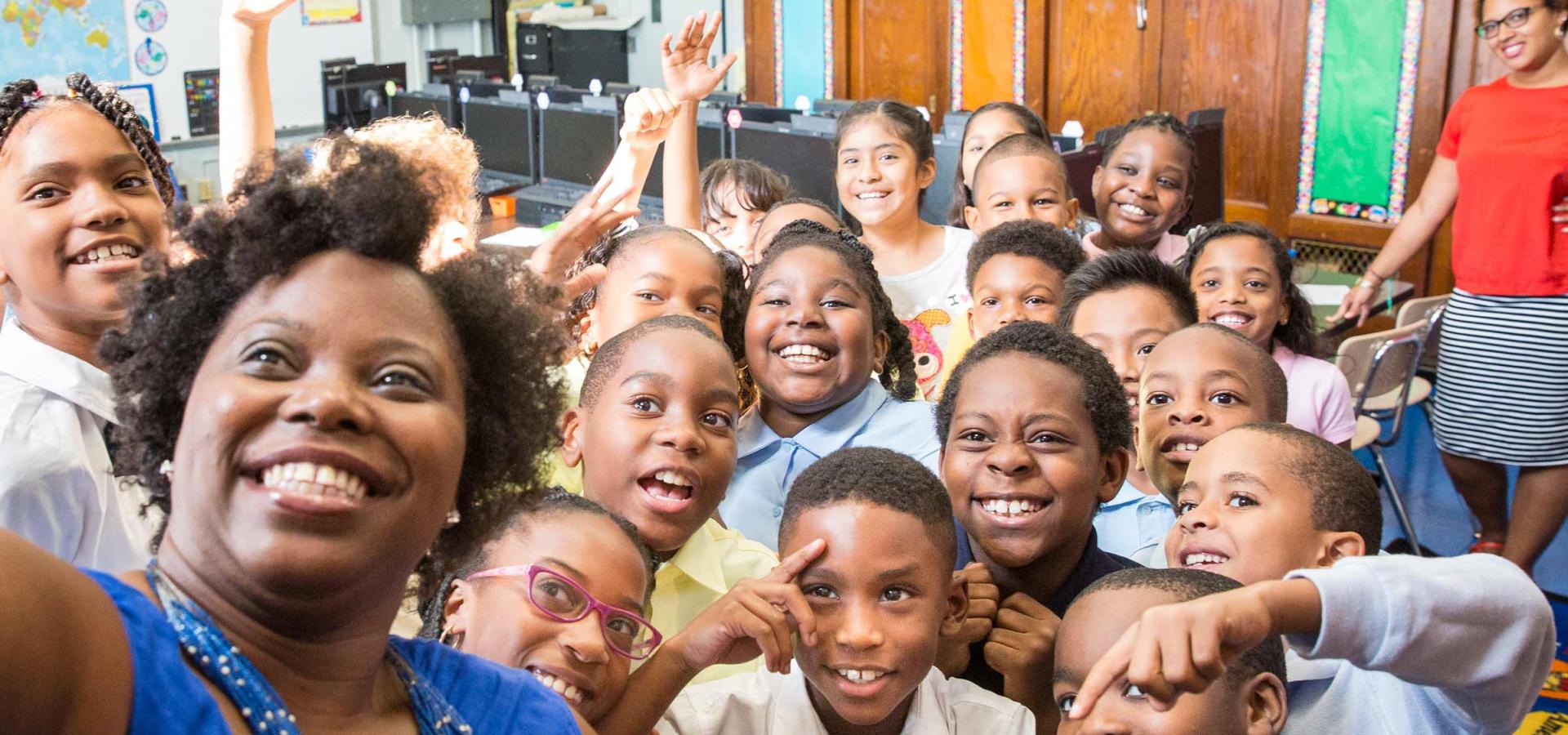 Teacher and kids take a selfie