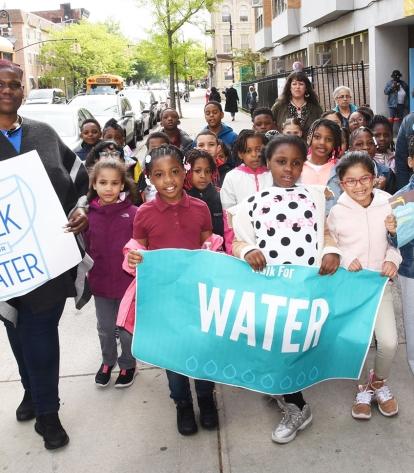 Students at PS 81in Brooklyn marched through the neighborhood with signs demanding clean drinking water.