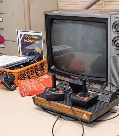 Westhall displays a cathode tube television and a 1980 Atari video game system i