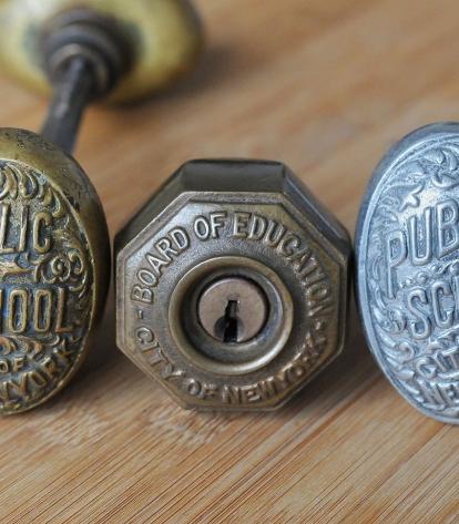 Every classroom opened with a handsomely carved brass door knob.
