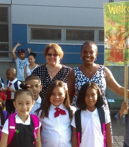 Chapter Leader Helene Loomis (back row, left) and teacher Arlene Sarjeant welcom