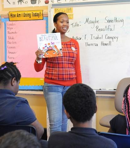 Teacher Carlisa Luke discusses the book with her 3rd-graders.