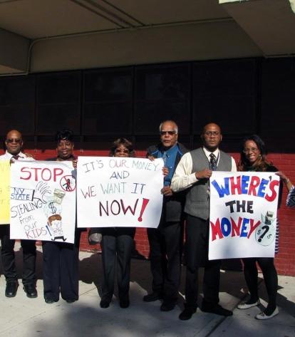 A group of members from IS 292 in East New York, Brooklyn, with Chapter Leader C