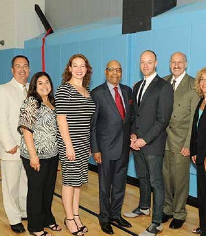 Posing after the gym opening ceremony.
