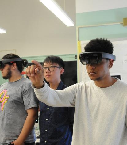 A student uses the HoloLens “mixed-reality” tool.