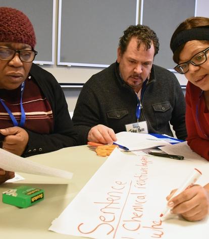 Victoria Fuller (left) and John Ross from IS 192 in Queens and Carol Johnson fro
