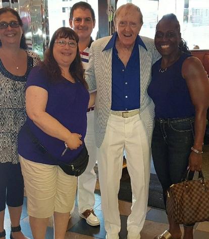 Lois Sarnoff (second from left) with 88-yearold Joseph Hassett and some of his o