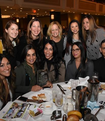 UFT members and the principal from PS 65 in Queens, a UFT community learning sch