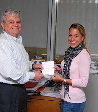 Liza Weinstein submits her UFT membership card to her grandfather.