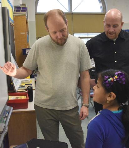 Natalie gets some help identifying the tiny creature she has just transferred to