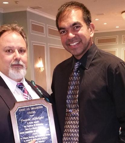 From left: Social Workers and Psychologists Chapter Liaison Don Albright with Ch