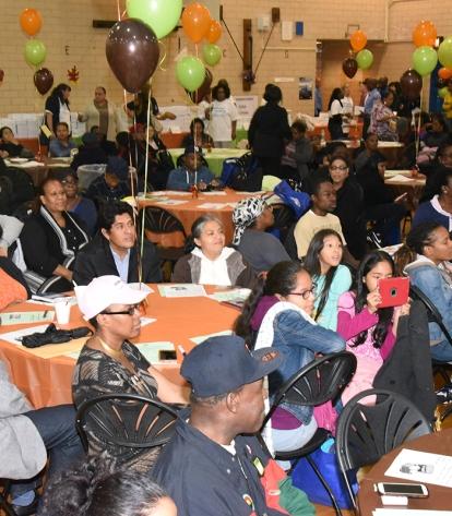 The Brooklyn conference begins in a festive setting in the PS 140 cafeteria.