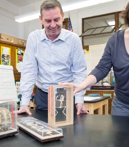 Fiume shows her latest collection of skeletons to Chapter Leader Sokol Muja.