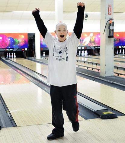 ... and Adam reacts after toppling all the pins before ...