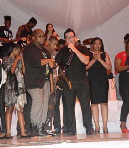 Drama teacher Michael Rice (left) and music teacher Michael Carlotto thank the s