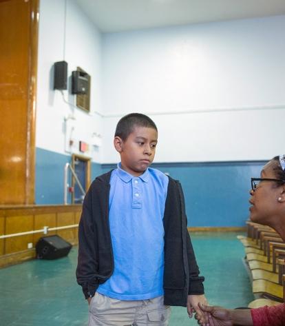 Hugs and serious discussions are all in a day's work for dance teacher Rashamell