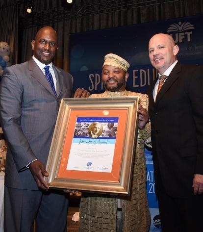 The Rev. Henry A. Belin III (left), the chairman of the board for the Food Bank 