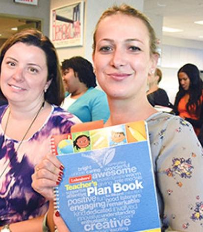 PS 31 teachers Malgorzata Drapala (left) and Tara Franco attend the Brooklyn mee