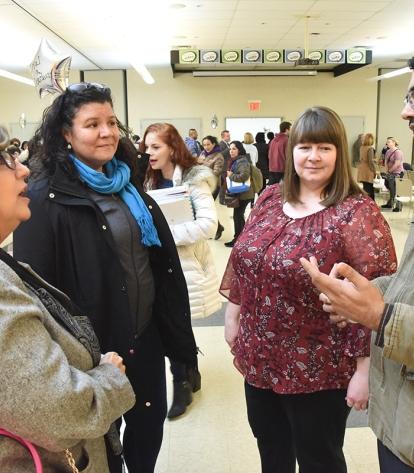 Bronx: Chatting after the Bronx meeting on Dec. 8 are (from left) Speech Improve