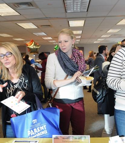 Brooklyn: New members in Brooklyn pick up information on salary and pension duri