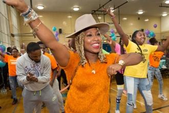 Shola Roberts, a teacher at MS 354, joins in on a flash mob she choreographed th