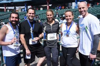 UFT Vice President for Middle Schools Richard Mantell (right) poses with trophy 