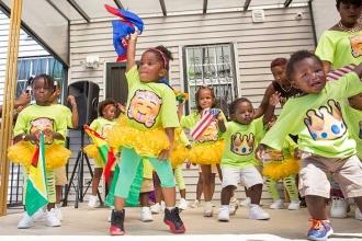 The program opens with a spirited dance.