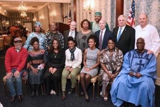 The award recipients gather for a group photo with UFT officers and staff.