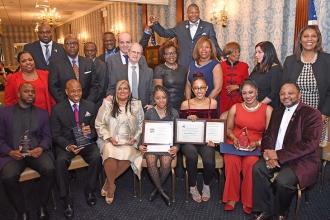 The night’s award recipients gather for a group shot with dignitaries, UFT offic