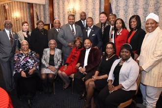 Members of the Queens NAACP pose together.