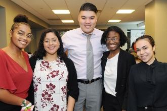 Smiles all around from the winning quartet from the HS for Arts and Business: Na