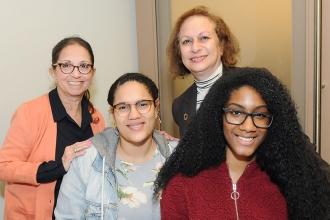 Manhattan Academy for Arts & Language Principal Siv Boletsis (top, right) and pa