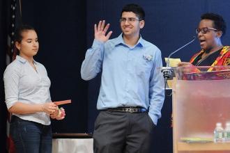 Ahmad Malik of Aviation Career and Technical Education HS waves to family as UFT