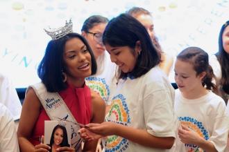 Kids chat with woman