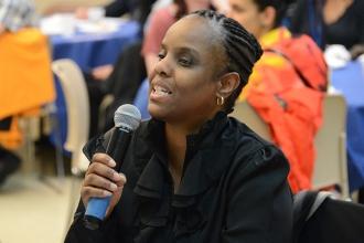 April Dean, a guidance counselor at P188@301 in District 75, asks a question. Re